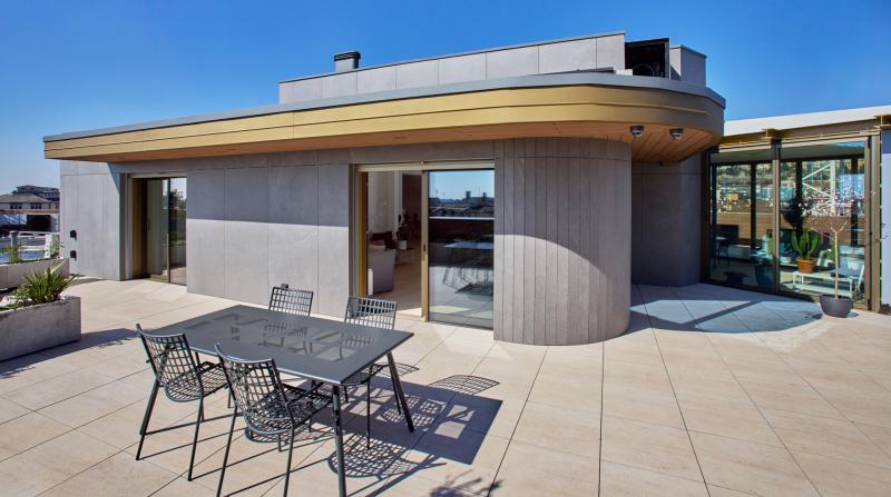SERVALLI ARCHITETTURA Rigenerazione urbana per i locali tecnici di una palazzina